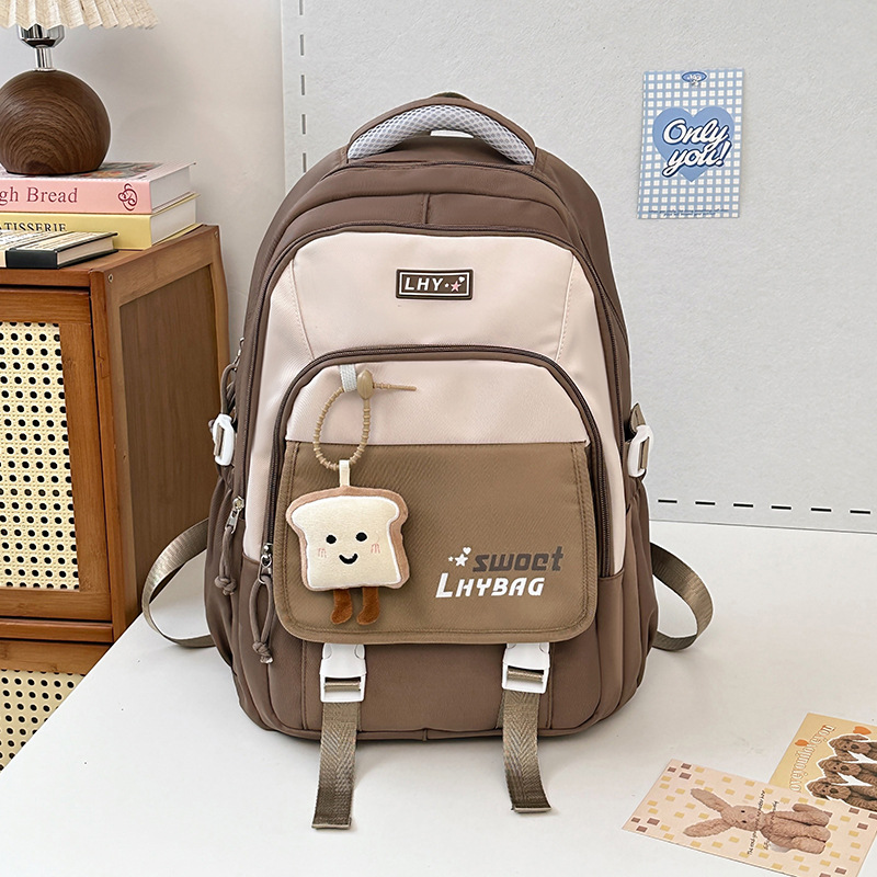 New breathable, weight-reducing and spine-protecting junior high school backpack for girls, cute. Large-capacity candy-colored backpacks for grades three to six full figure