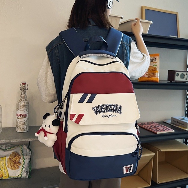 2024 New schoolbag: Cool, large-capacity, high-appearance-level backpack for junior high school boys, and a couple backpack for female college students full figure