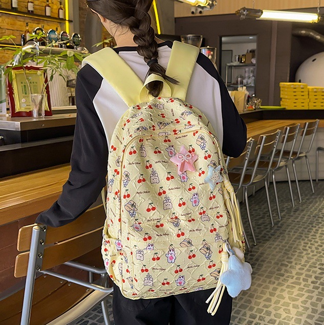 New female ins style cherry print backpack with large capacity, casual and high appearance level, cute cartoon schoolbag for middle school students full figure