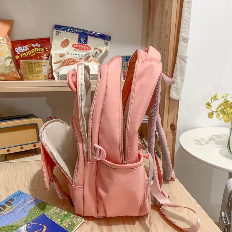 New simple and trendy middle school schoolbag, solid-color outdoor casual backpack, Korean-style nylon cartoon backpack for girls Application Scenario