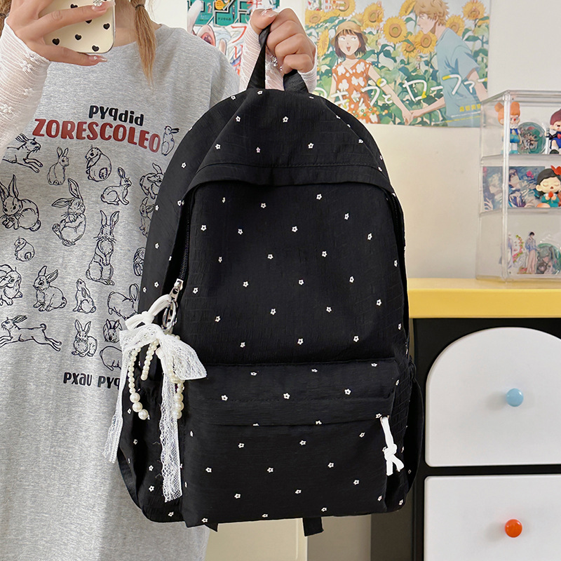 A new, lightweight and durable Japanese-style floral mini backpack that is versatile and suitable for college students details Picture