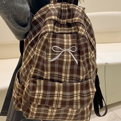 The new large-capacity backpack with a checkered pattern and a fresh and cute school style, the lightweight backpack, and the new forest-themed bag for autumn and winter Specification drawing