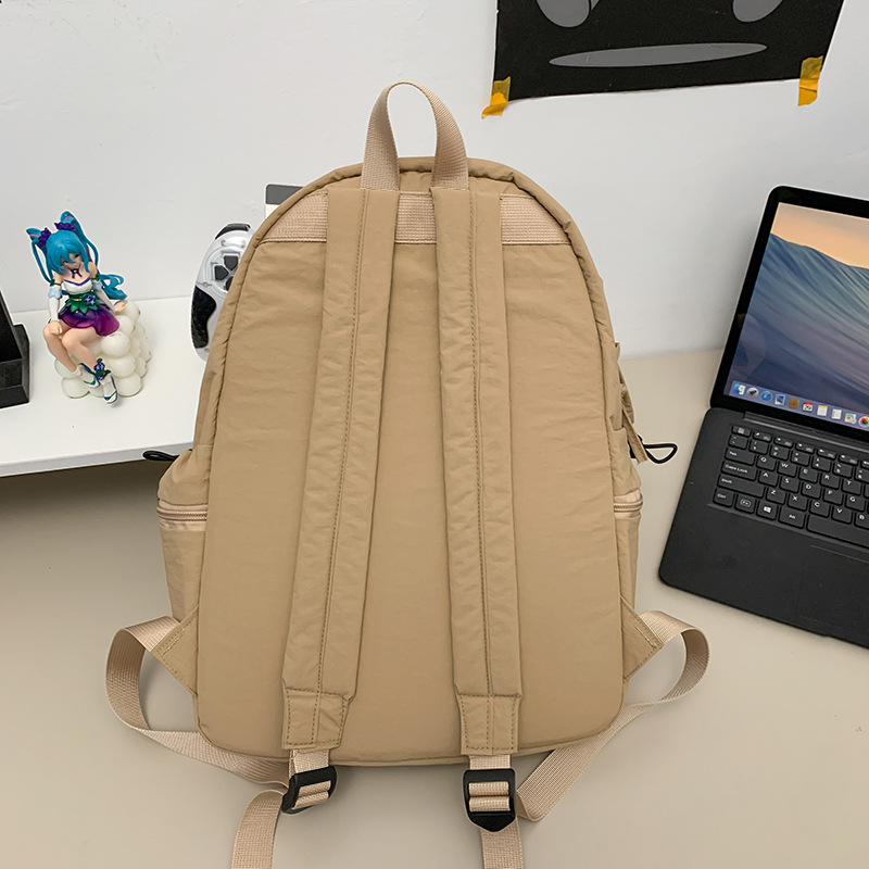 A large-capacity, simple and versatile backpack in the style of Muji from Japan and South Korea, a lightweight, solid-color Harajuku style backpack for high school students on campus Specification drawing