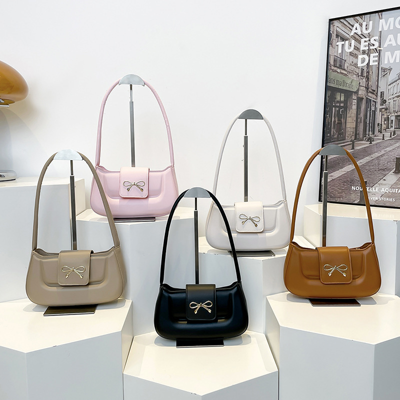 Embossed simple, casual and retro solid color 2025 Spring new style bow fashion design single-shoulder armpit small square bag Application Scenario