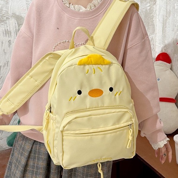 The new winter version of the "Crying Black Cat" backpack, schoolbag, emoticon character, little yellow duck pain bag is detachable and has a large capacity for classes details Picture
