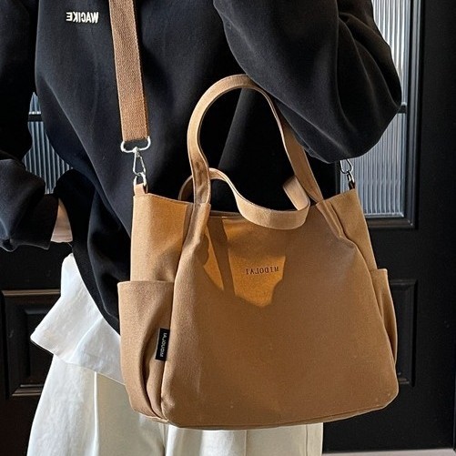 A versatile and large-capacity new single-shoulder bag for women, a fashionable spring and summer bag, a casual school and commuting bag for women, and a hand-held tote bag details Picture