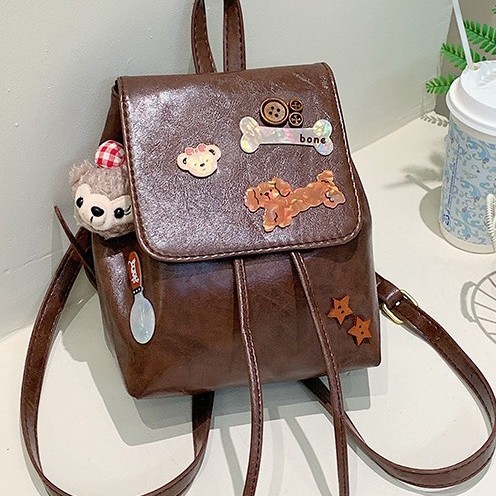 Cute cartoon bone dog backpack, a new retro casual and fashionable backpack for girls' commuting full figure
