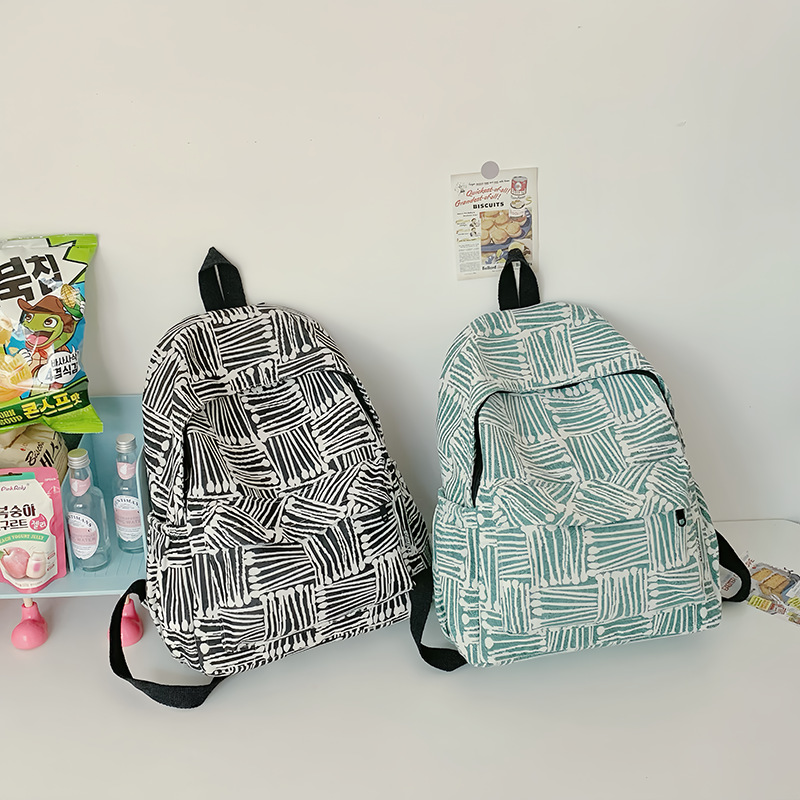 Travel backpack, student schoolbag, striped campus new backpack, niche casual travel, large capacity, trendy color contrast full figure