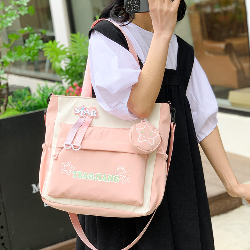 Cute star-shaped crossbody bag, girls' handbag, high school and junior high school students' tutorial class bag, large-capacity single-shoulder bag details Picture