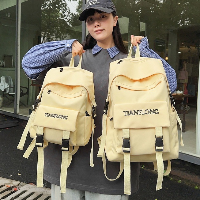 Simple solid-color schoolbag, female college students' commuting and casual backpack, versatile backpack for junior and senior high school students in autumn and winter, couple backpack full figure