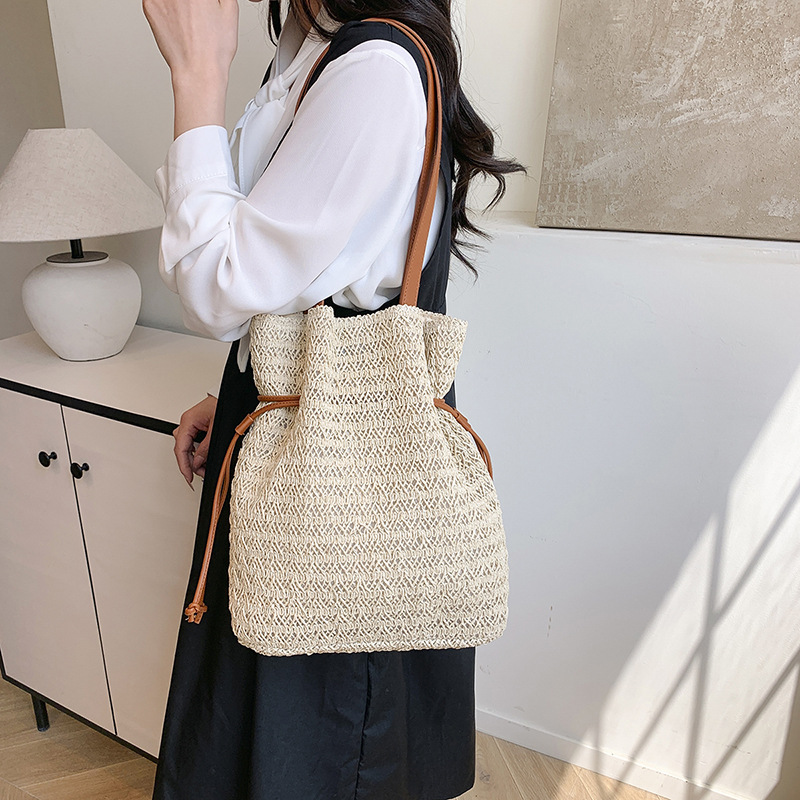 Large-capacity woven bucket bag for women, 2025 new style light luxury versatile single-shoulder bag, fashionable beach vacation bag details Picture