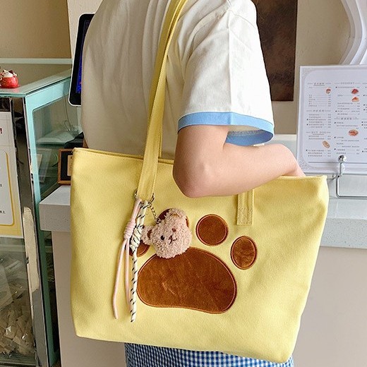 New large-capacity cartoon hand-held canvas shoulder bag, single-shoulder bag, storage bag, cute cartoon cat paw handbag for girls details Picture