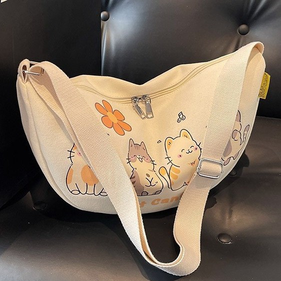 New versatile canvas single-shoulder bag for commuting, student ins Korean style, laid-back style, cartoon and cute underarm bag, crossbody bag details Picture