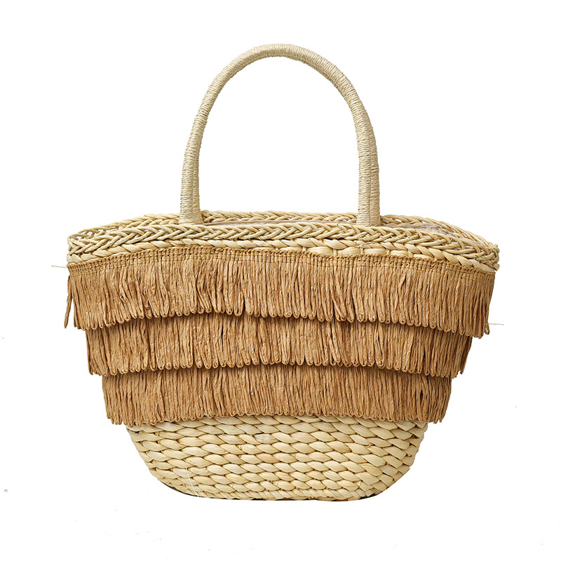 Summer seaside vacation, stylish Suzhou grass woven vegetable basket bag, trendy women's fringed casual forest-style fashionable handbag Item Picture