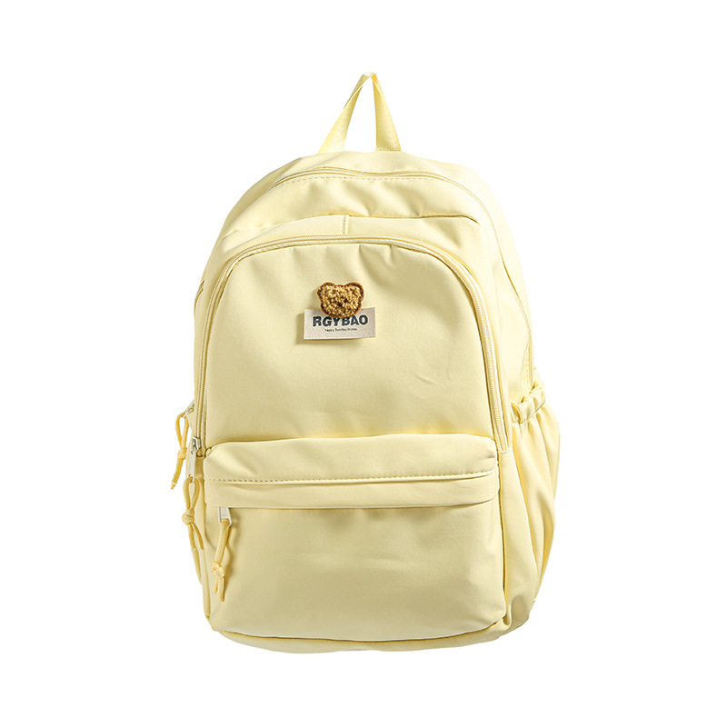 Junior high school student backpack: Korean Instagram cream yellow forest style, versatile, high appearance level girl backpack, high school student backpack Item Picture