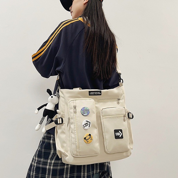 Korean-style workwear-style casual crossbody bag for men, large capacity, cool and versatile, sports and commuting, college student hand-held shoulder bag full figure
