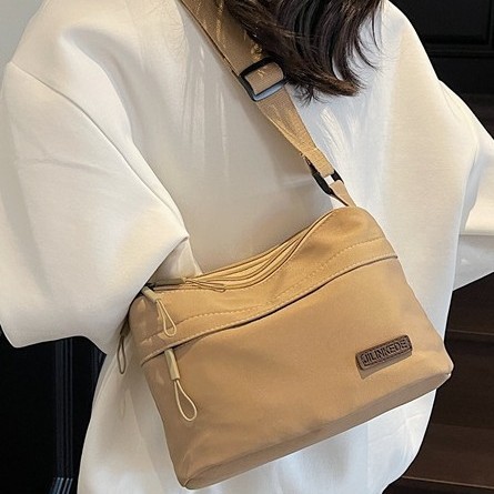 A new, water-resistant, lightweight and fashionable single-shoulder bag made of nylon fabric for women, a multi-layered crossbody bag and a casual bag that is selling well across borders full figure