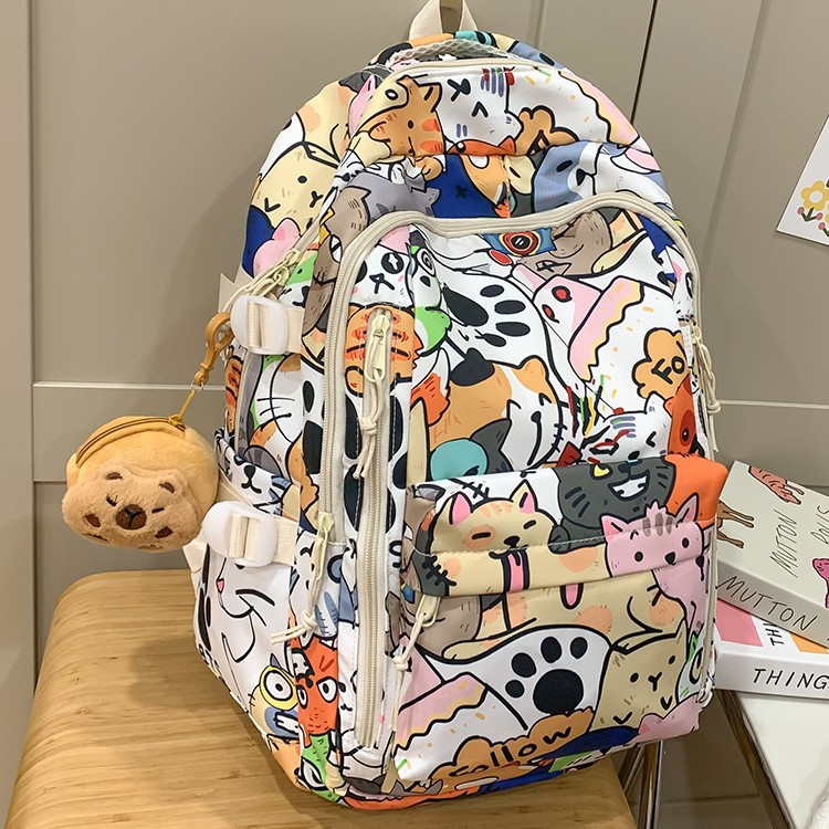 The new schoolbag is simple and elegant. It is a large-capacity printed college style fashionable backpack and a cute casual backpack for female college students details Picture