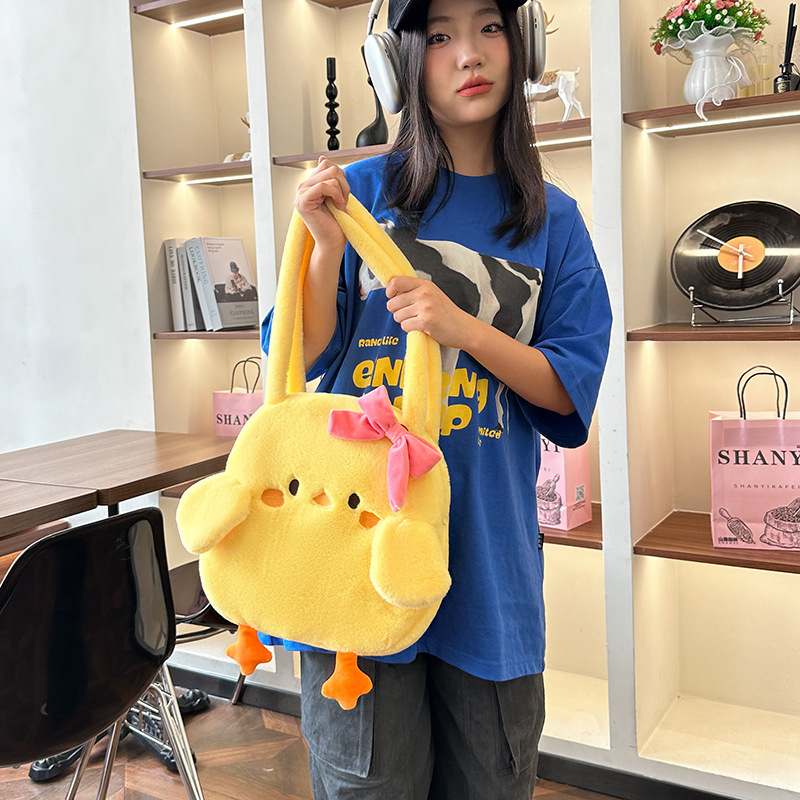 Cartoonson-style ins Hong Kong-style little yellow duck bow single-shoulder bag 2024 new style, versatile and girlish plush hand-held details Picture