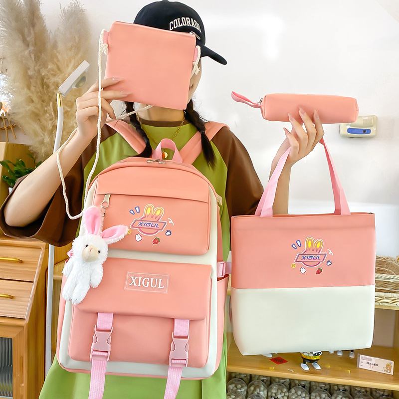 A Korean-style casual backpack for women, a fashionable and trendy high school student backpack set of four pieces, and a large-capacity outdoor travel backpack full figure