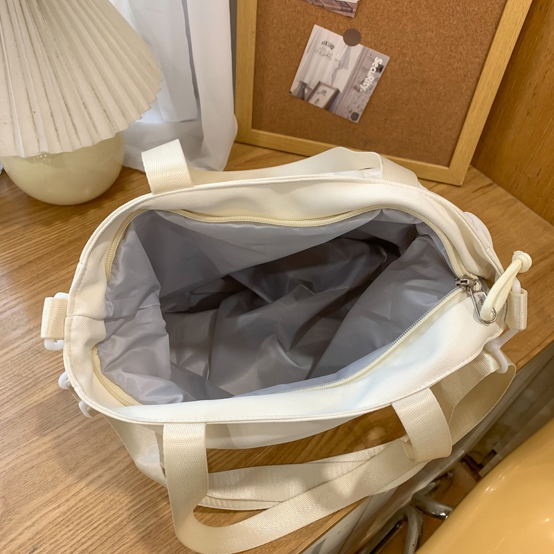 Japanese-style ins Academy style tote bag for junior high school students' classes, cute cartoon embroidered dog, large-capacity single-shoulder bag Application Scenario