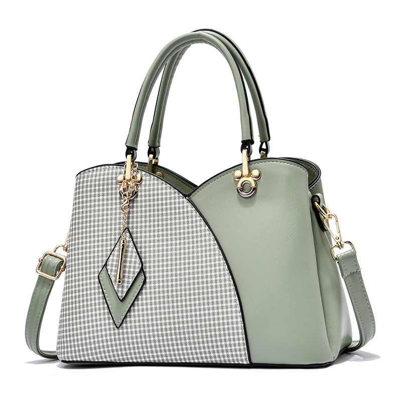 The 2022 new trendy and fashionable handbag, a single-shoulder crossbody bag, is a versatile and elegant commuting lady's bag full figure