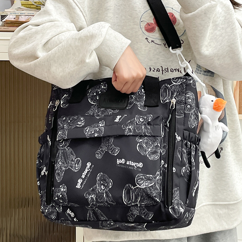 Casual and sweet style printed single-shoulder bag, cartoonish, simple and lightweight single-shoulder, fashionable Japanese waterproof tutorial bag for college students full figure