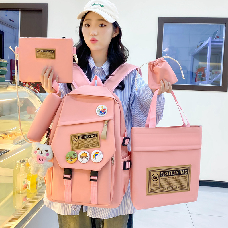 This year, simple solid-color school bags for junior and senior high school students, five-piece campus backpacks, and multi-functional tutorial backpacks are in fashion details Picture