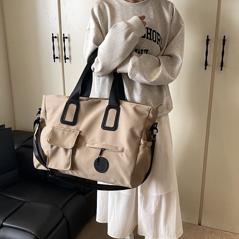 Travel bag, large-capacity fashionable solid-color single-shoulder boarding bag, light and simple commuting hand-held yoga bag, maternity bag Specification drawing