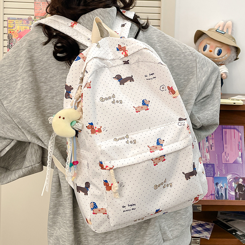 A cute Japanese-style double-shoulder backpack for junior and senior high school students, a floral puppy backpack for college students, and a large-capacity schoolbag Application Scenario