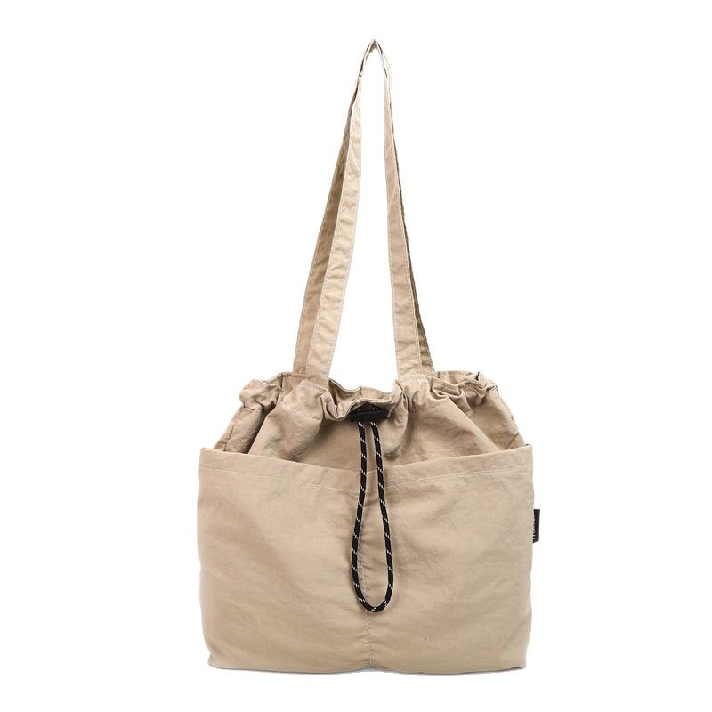 New single-shoulder tote bag, large-capacity autumn and winter nylon fabric drawstring pleated travel bag, casual crossbody bucket for keeping warm Item Picture