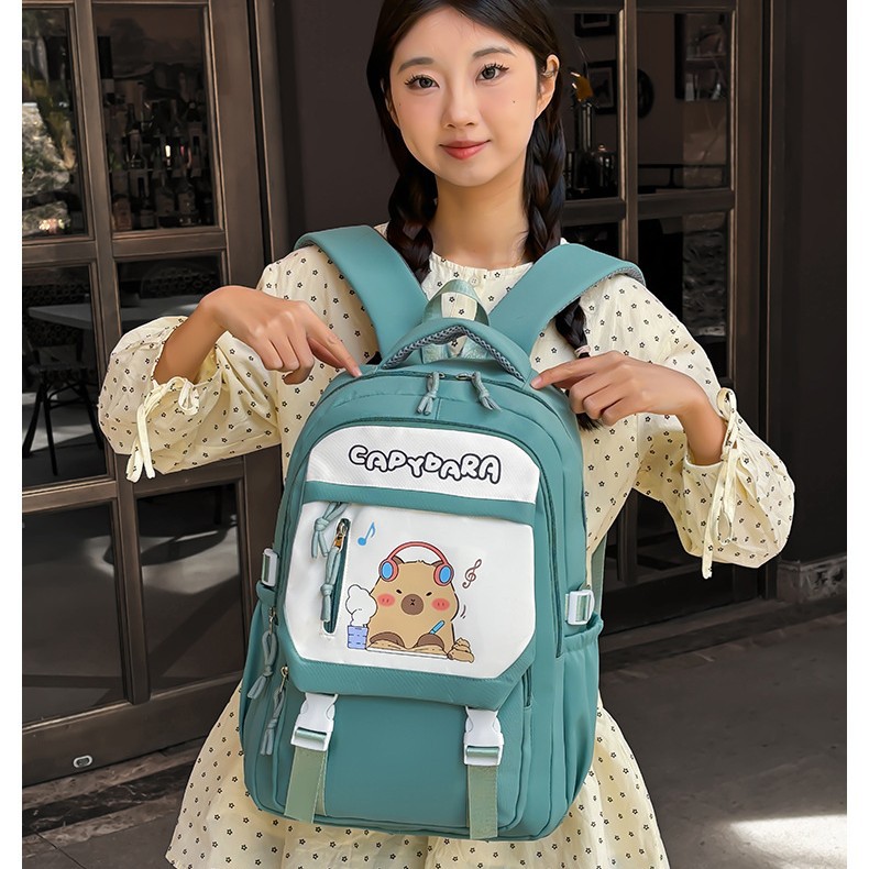 The new best-selling Kapipala cartoon printed backpack is a large-capacity schoolbag for primary and middle school students, which is cute and fashionable details Picture