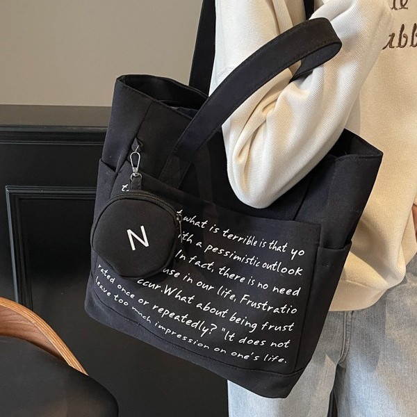Fashionable and casual lettered canvas bag for women, versatile, large capacity for students to attend classes and commute, large capacity underarm single-shoulder bag Application Scenario
