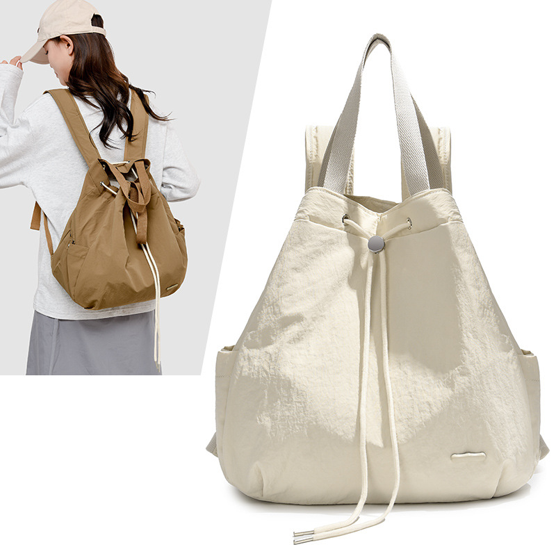 A versatile and fashionable drawstring backpack for women, a new 2024 niche casual Instagram simple commuting bag, a lightweight small bag full figure
