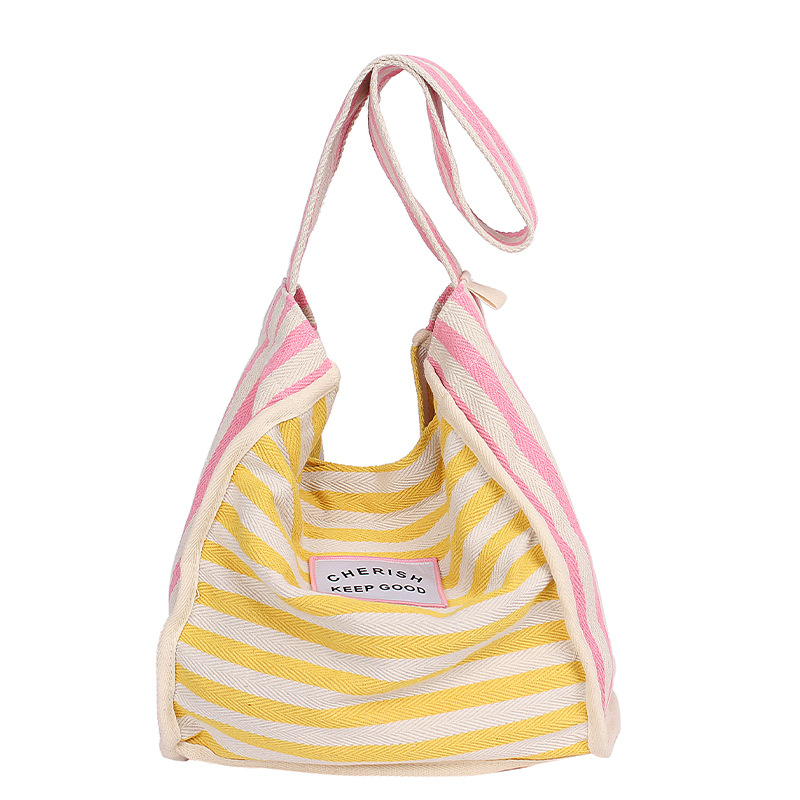 Fashionable striped color-blocking bag, new spring trendy, casual and versatile, large-capacity single-shoulder bag, striped canvas bag Item Picture