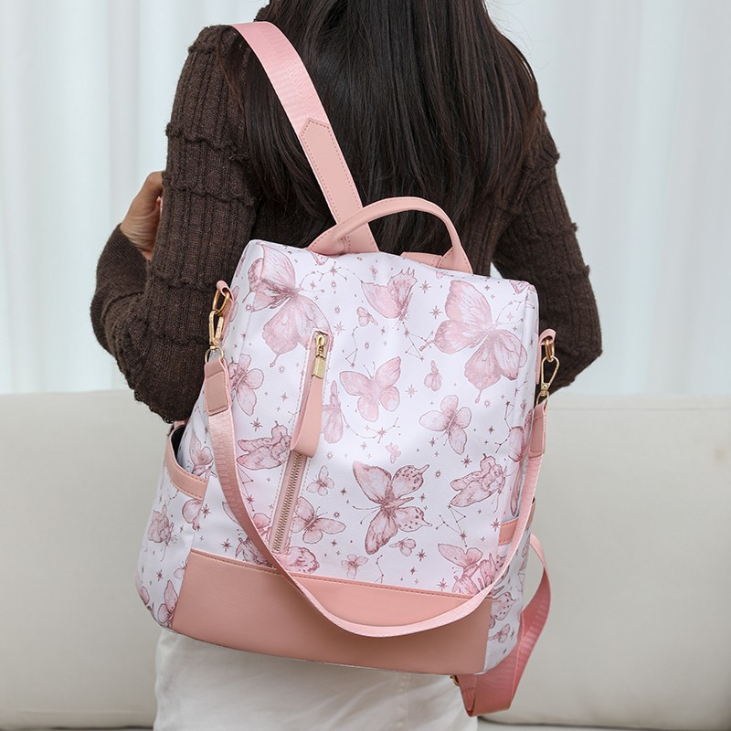 The new printed backpack is a fashionable large-capacity hand-held shoulder bag for women. It is a casual travel backpack and very cute Application Scenario