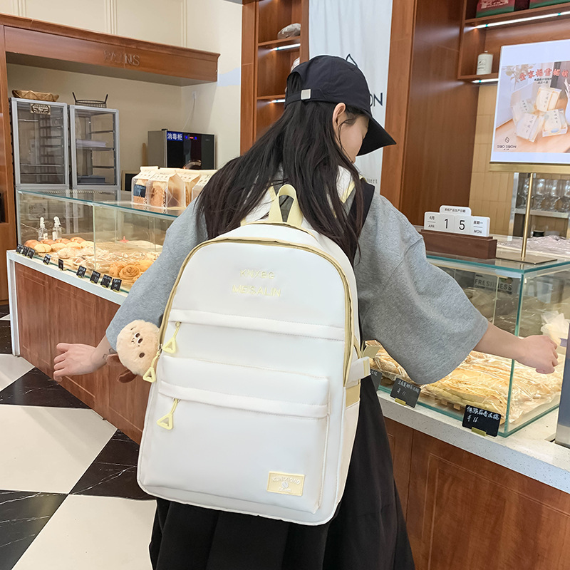 A new type of backpack for junior high school students, high school and college students, solid-color campus large-capacity commuting and travel backpack details Picture