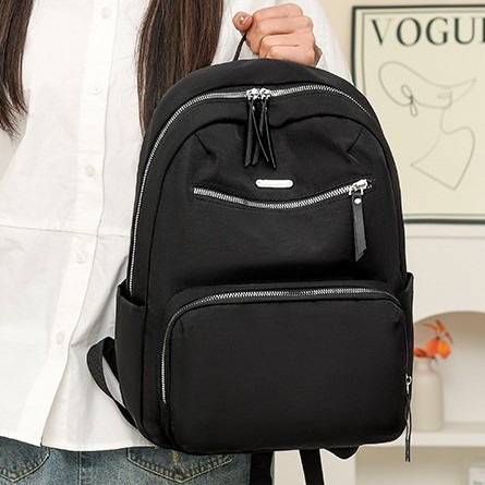 A new Korean version of a trendy and casual backpack for women, a large-capacity student backpack, and a fashionable Oxford fabric outdoor travel backpack details Picture
