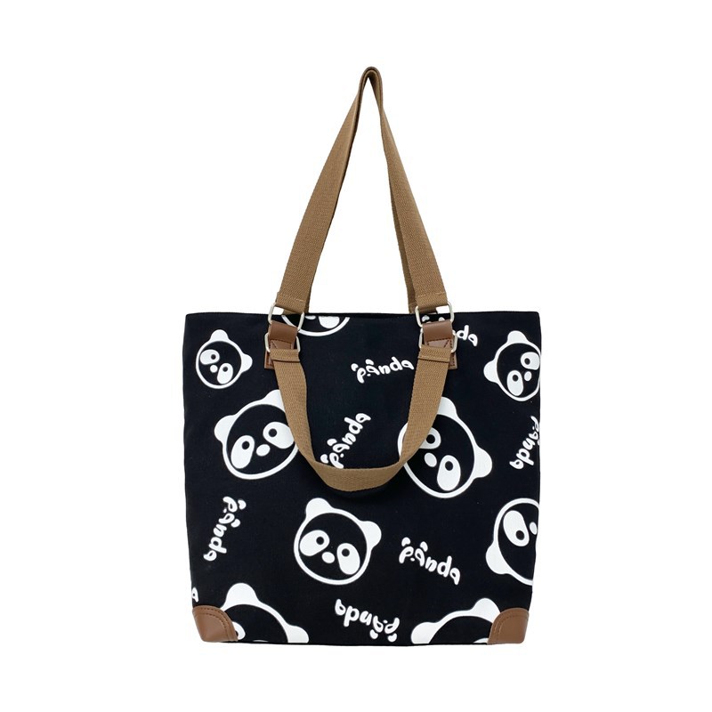 A niche new 2025 Panda hand-held canvas bag for girls to attend classes, a crossbody bag for college students, and a single-shoulder bag for commuting and going out Item Picture