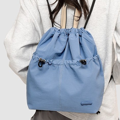 Japanese and Korean ins drawstring backpacks, simple solid color, lightweight and large-capacity commuting backpacks, outdoor sports bags full figure