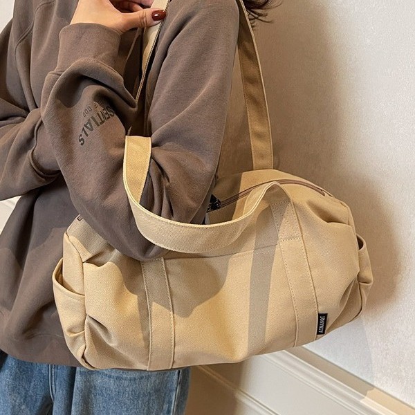 Casual new trendy Japanese-style artistic pure cotton canvas handbag, single-shoulder bag, Boston bag, casual bag and travel bag Application Scenario