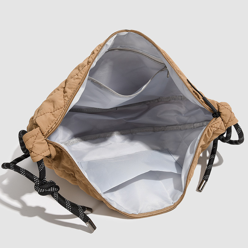 Large-capacity crossbody bag for women, simple large-capacity dumpling bag, new autumn and winter cotton-padded jacket bag, diamond-shaped embroidered thread single-shoulder bag Application Scenario