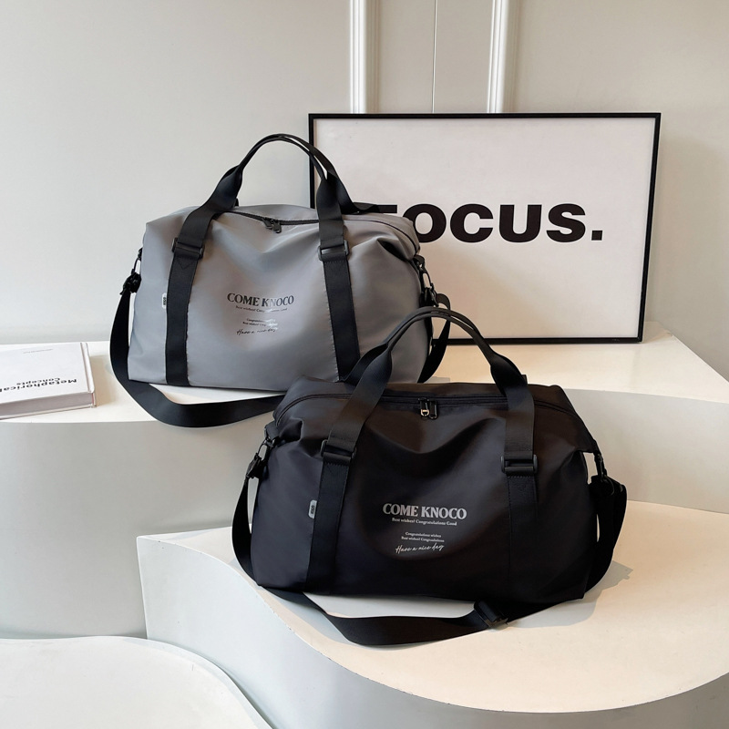 Wholesale of large-capacity fashionable travel bags, business trip boarding short-distance luggage storage bags, lightweight casual sports and fitness bags details Picture