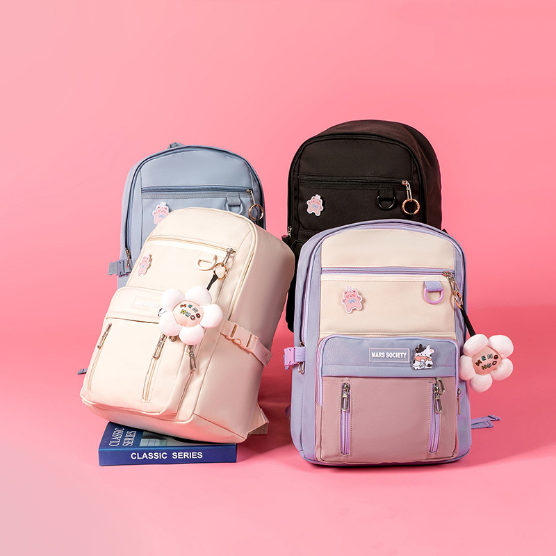 A new multi-color, large-capacity, lightweight backpack for girls in the middle school, a nylon Korean-style backpack, has been designed details Picture