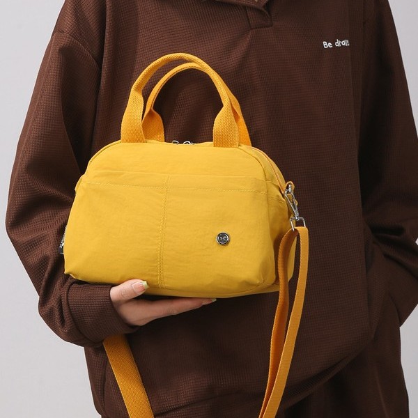 A new solid-color casual and versatile women's backpack, a multi-color Oxford fabric single-shoulder crossbody handbag, lightweight and with a large capacity Specification drawing