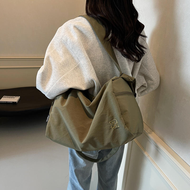 Wholesale of new travel bags, women's large-capacity lightweight hand-held fitness bags, dry and wet separation casual cases, and luggage bags with handles details Picture