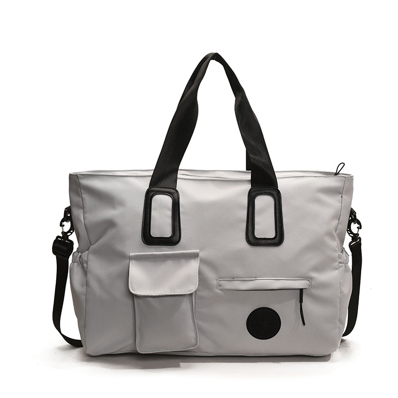 Travel bag, large-capacity fashionable solid-color single-shoulder boarding bag, light and simple commuting hand-held yoga bag, maternity bag Item Picture