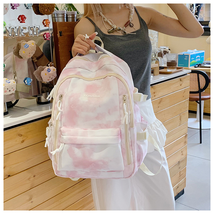 Personalized and trendy tie-dyed backpacks for male and female college students, fashionable backpacks for junior high school and senior high school students, large-capacity backpacks Application Scenario