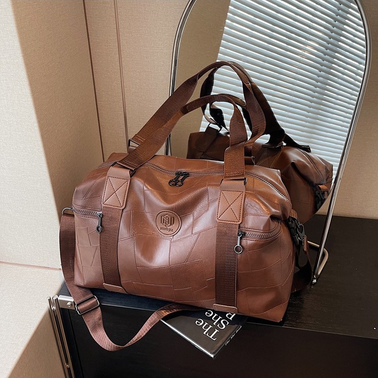 Thickened and durable hand-held travel bag for foreign trade, outdoor sports, leisure and fitness bag, large-capacity PU leather-like luggage bag full figure