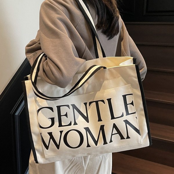 Casual and versatile hand-held large bag for women 2025 new Spring/Summer fashionable and simple tote bag, artistic letter single-shoulder bag Application Scenario